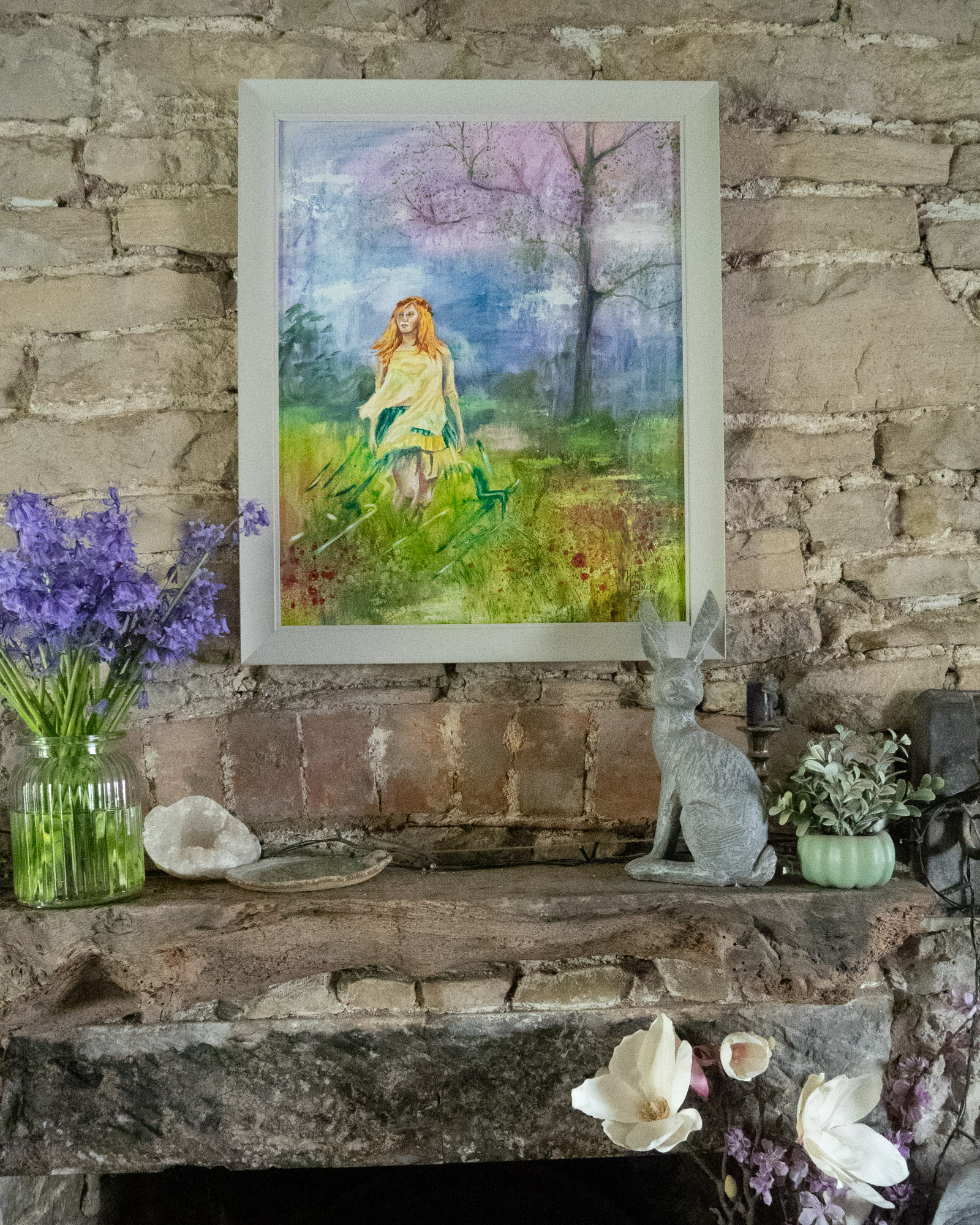 A painting of a woman walking through long grass and looking for someone. The atmosphere is ethereal and the colours are soft and mainly green and yellow. It has a modern fairytale feel.